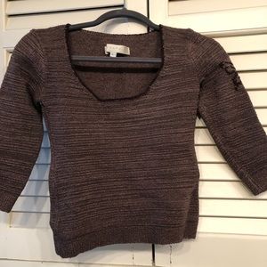 Top with embroidered butterfly on sleeve